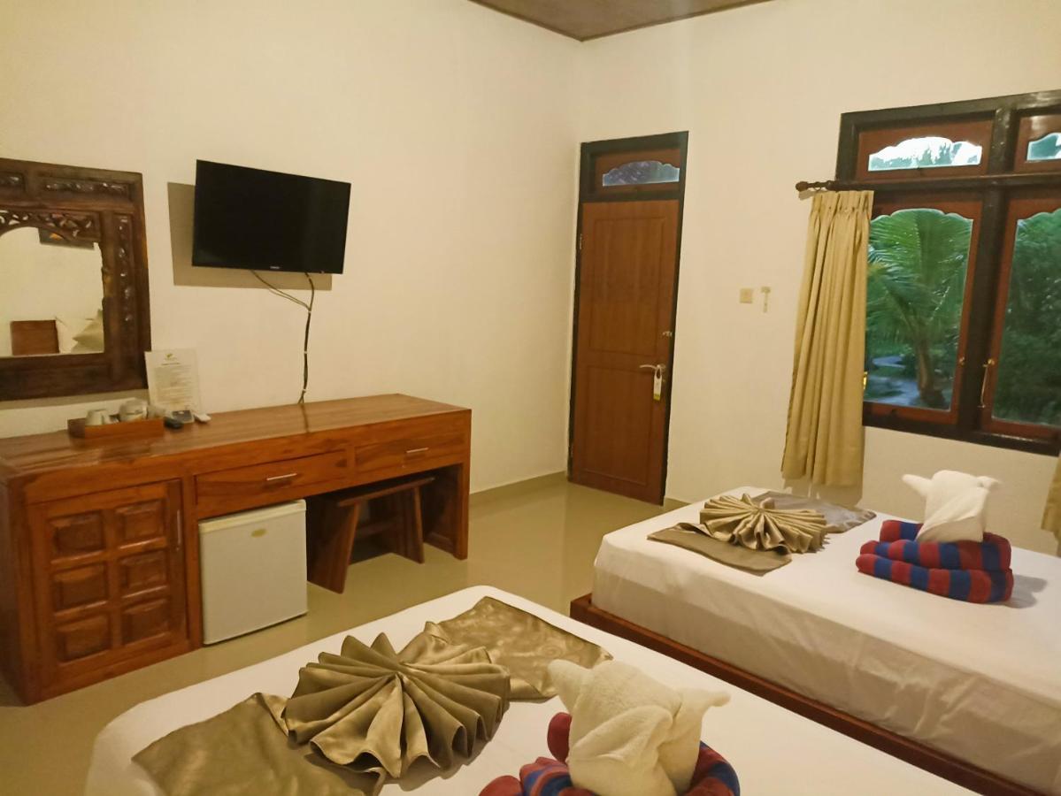 Kusnadi Hotel Легиан Экстерьер фото