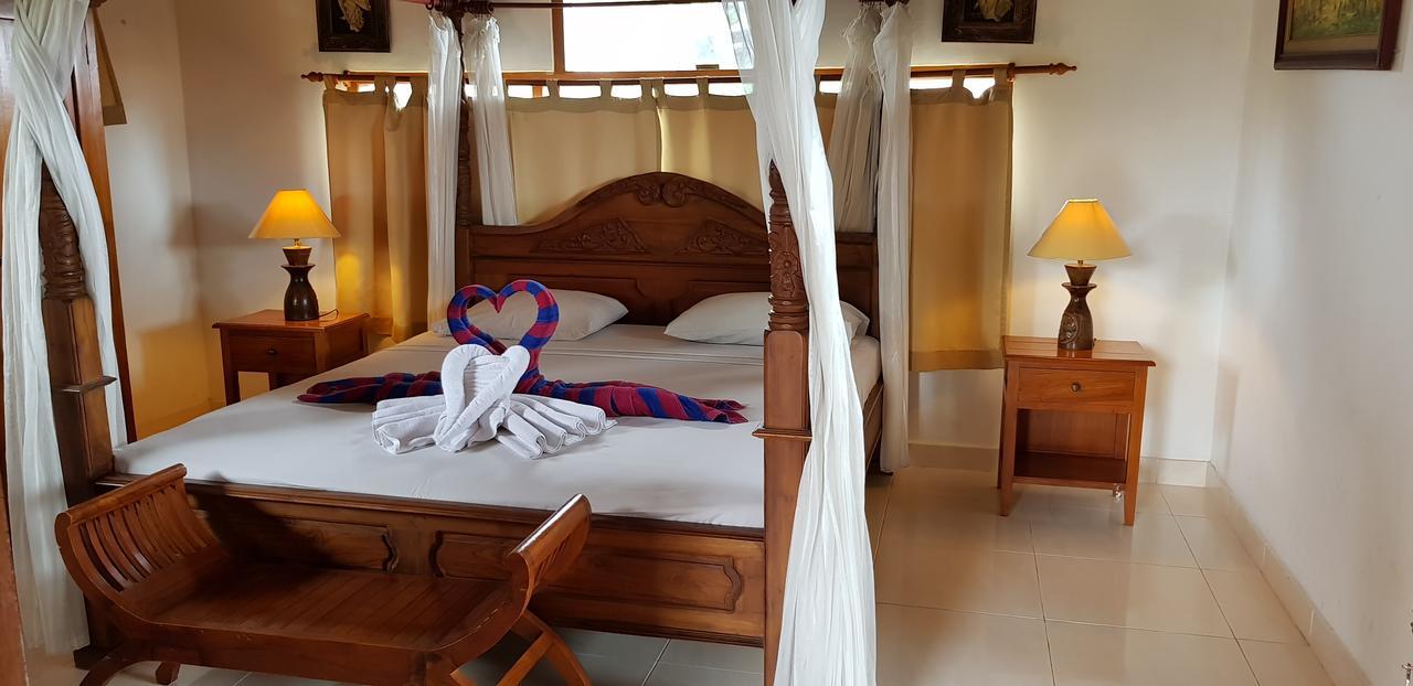 Kusnadi Hotel Легиан Экстерьер фото
