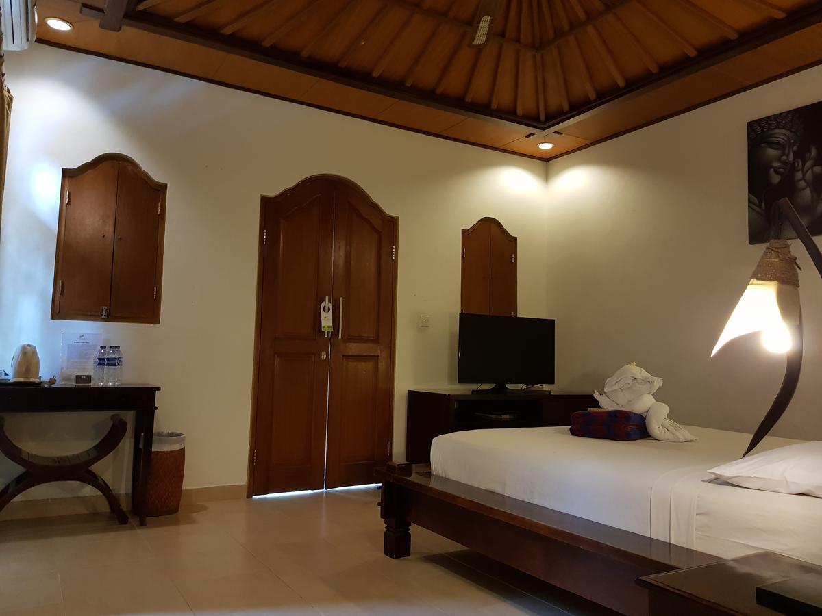 Kusnadi Hotel Легиан Экстерьер фото